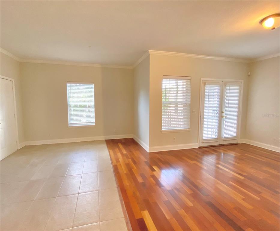 Living room with French doors that open to private patio