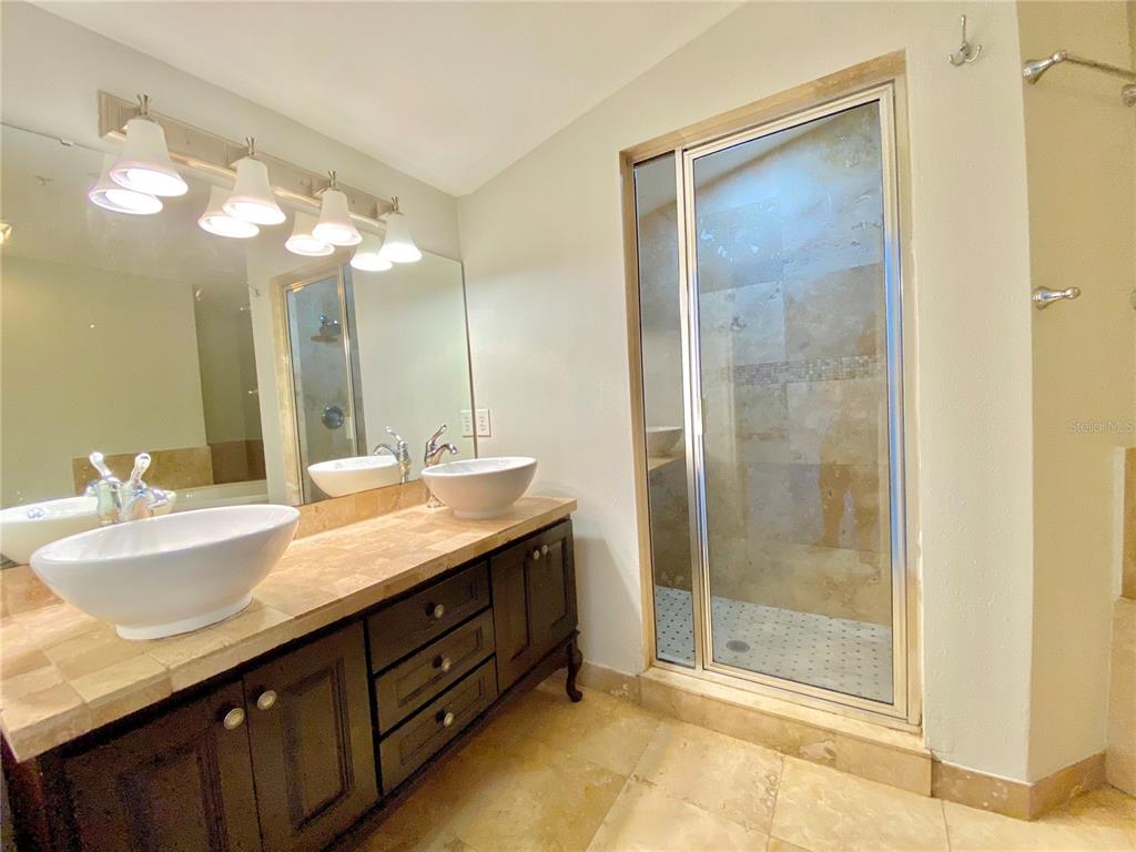On Suite Master bathroom with his and her sinks, separate shower and jacuzzi