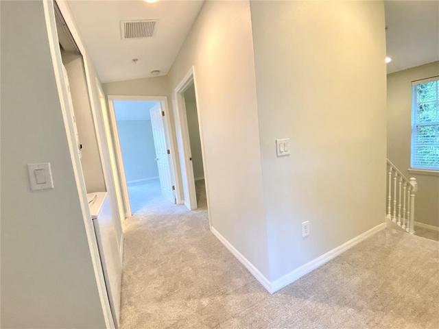 Hallway to second and third bedrooms