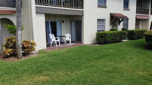 Covered patio overlooking pool and intercoastal waterway
