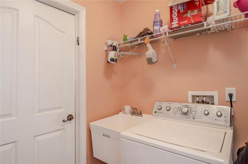 Attached in law suite, bedroom fridge and bathroom