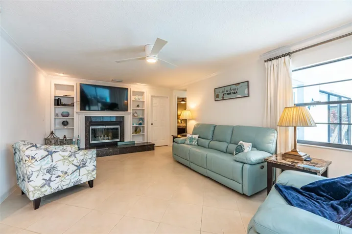 The family room has a big screen TV and a fireplace (even though we rarely need a fireplace in Florida!)