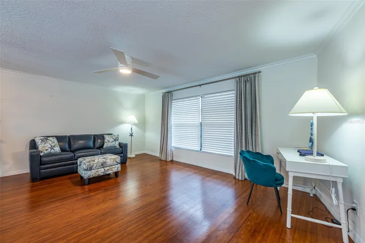 Formal living room is open to the dining room.