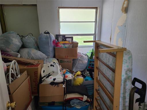 Storage room in Breezeway of laundry room