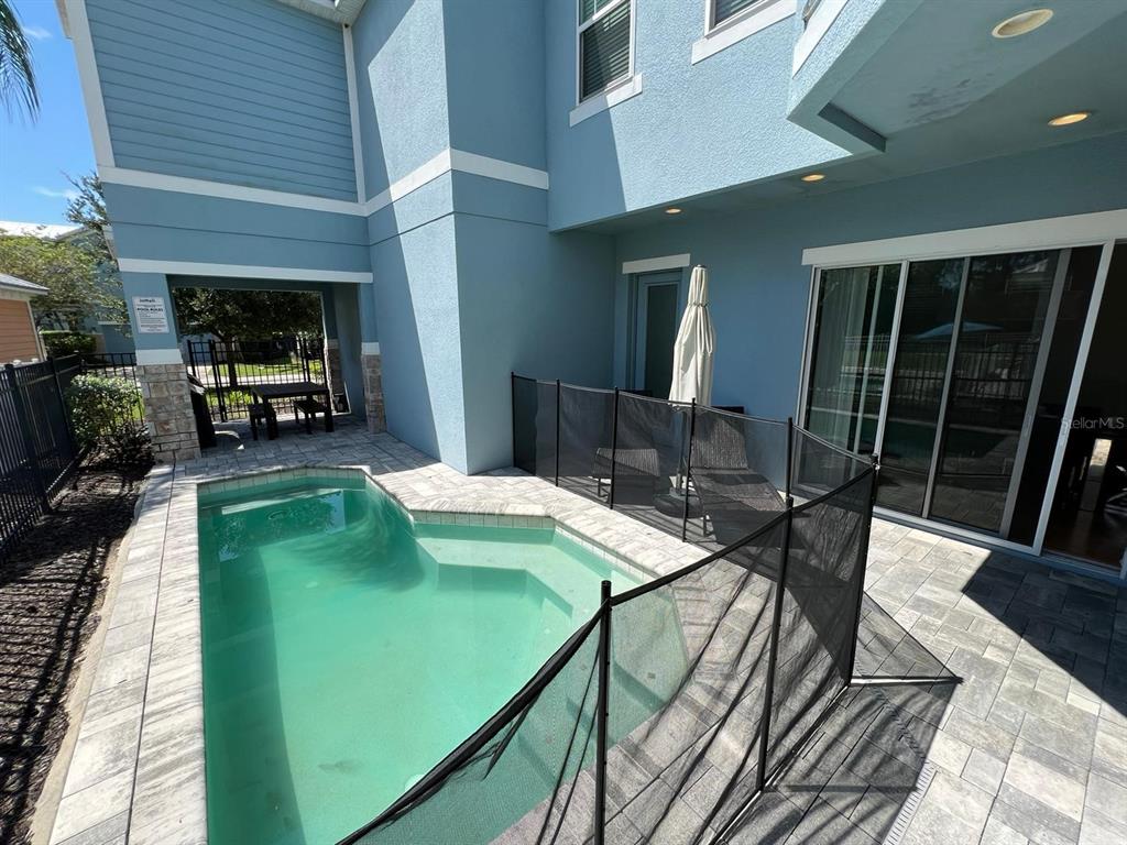 poll deck with brick paved flooring.