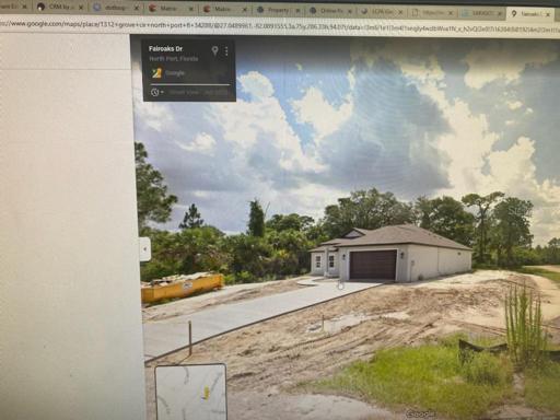 house newly built just 2 lots away from the property