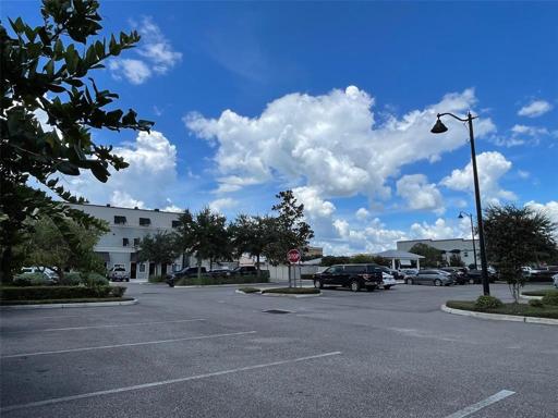 City of Wauchula Parking lot. Apartment building to the left and another apartment building that is completely occupied seen to the right!