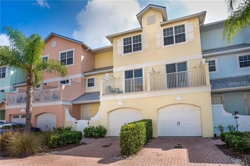 8920 Duval Lane shows beautifully in cool shades of sherbet- Your little piece of paradise is the yellow unit!