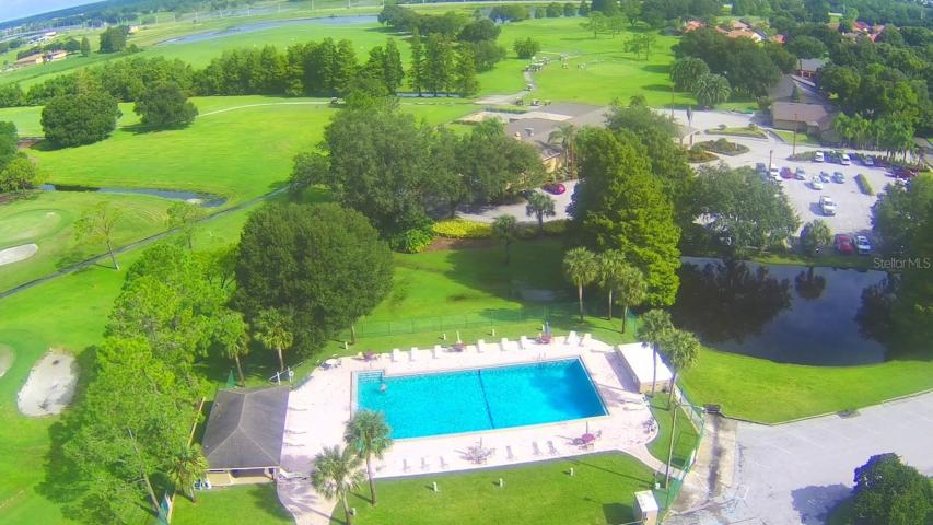 Community Pool & adjacent Clubhouse and Golf Course