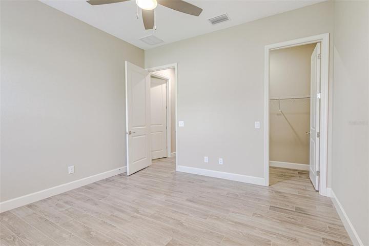 Bedroom #2 features a walk in closet