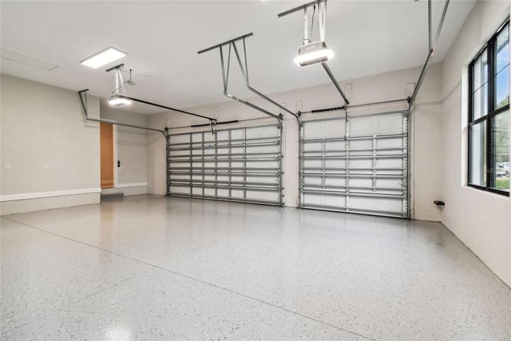 3 car garage with Epoxy floor