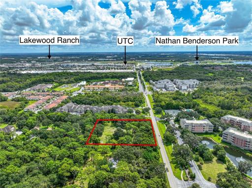 Panned out aerial showing proximity to shopping, restaurants, events, etc....