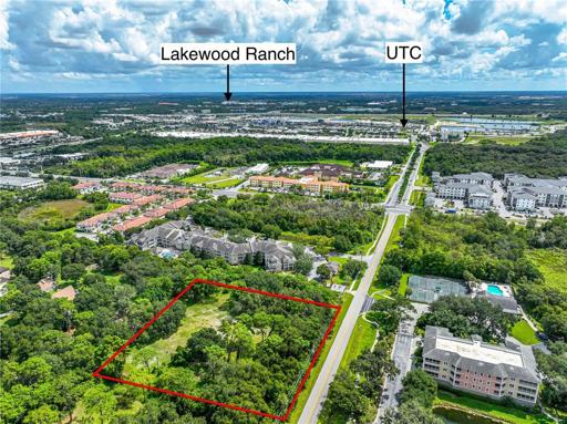 Side aerial of subject property showing proximity to shopping, restaurants, events, etc...