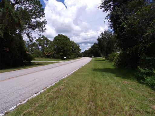 Facing Northeast looking up De Leon Dr