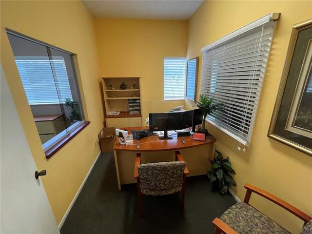 Agent desk off of hall from lobby