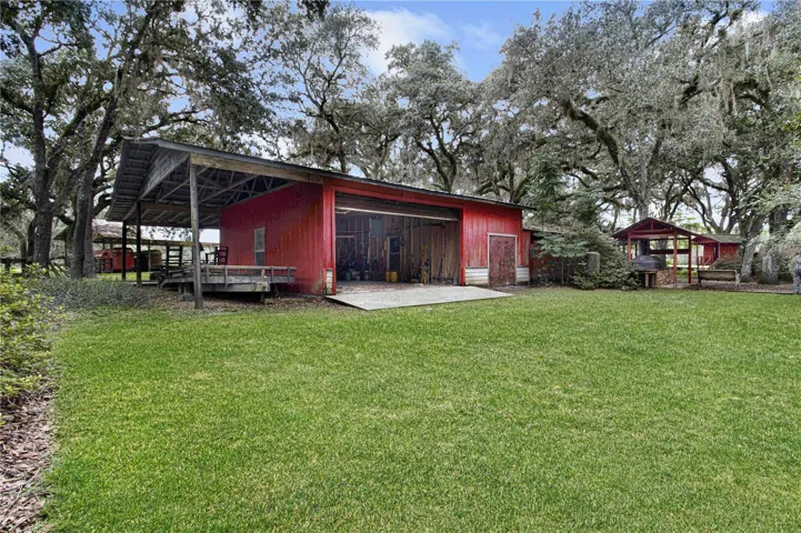 Garage with access to Work Shop and exterior storage