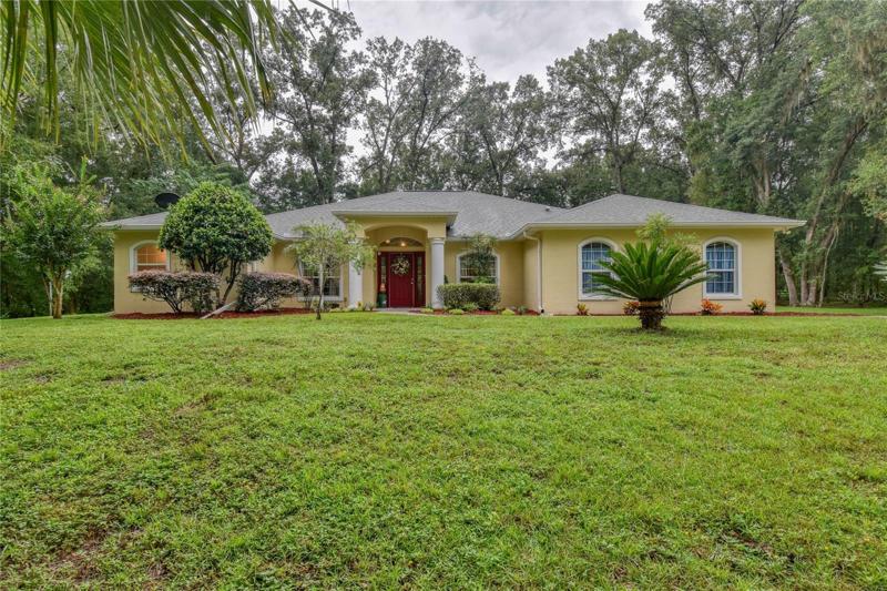 House sits back in about the middle of the property