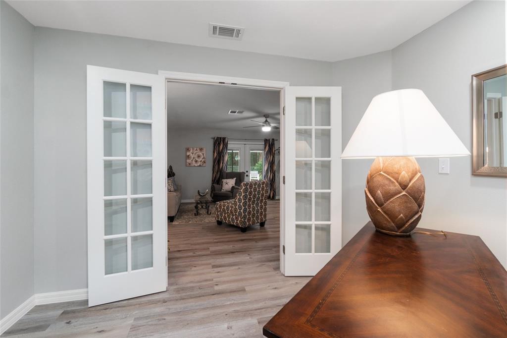 Den or office, french doors to living room