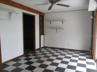 Den off of 2nd Garage