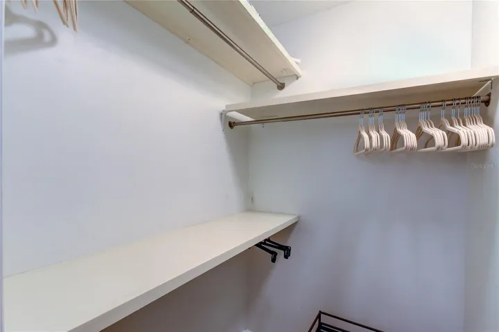 Bedroom #3 walk in closets ( 5x4.2) also built out for maximum storage capacity and more velvet hangers