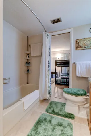 Large bathroom (7x10.1) offers a tub for those Calgon bubble baths