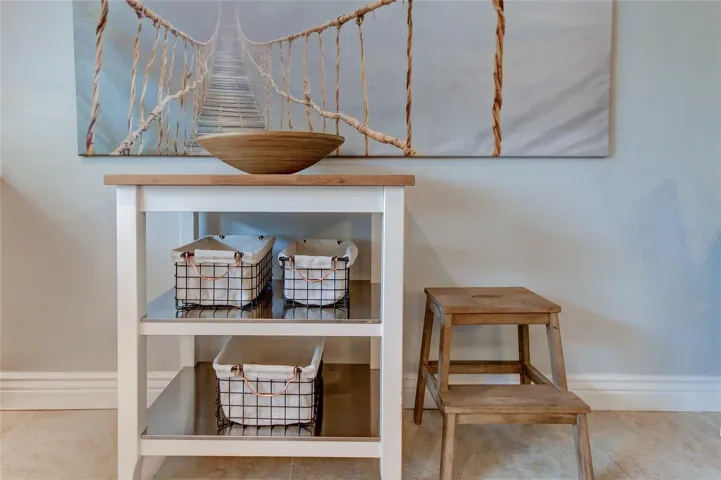 storage baskets for root veggies, step stool to reach the 42-uppers, portable butcher block island