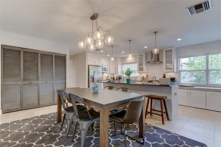 Dining room flows effortlessly into a HUGE kitchen (10x20) variety of lighting options