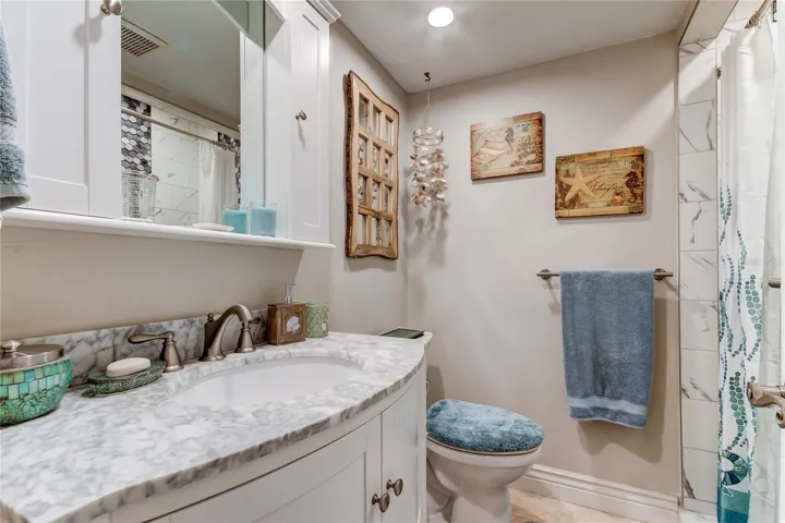 Bathroom # 3 (6x7.5) is off kitchen area