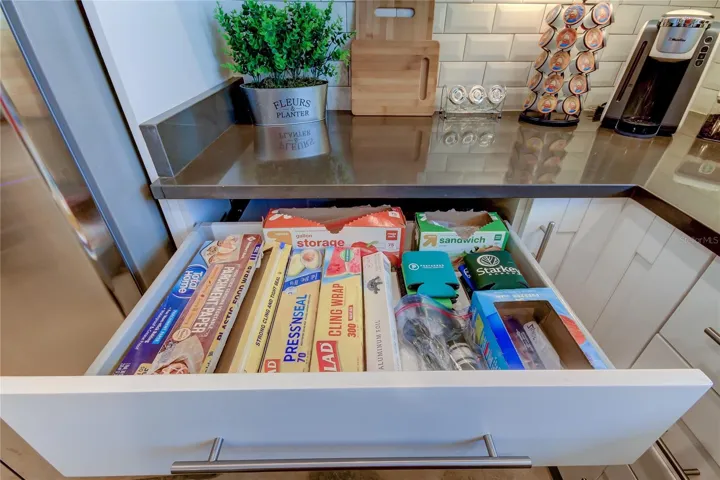 Stocked with foil, saran wrap, parchment paper, baggies of all size