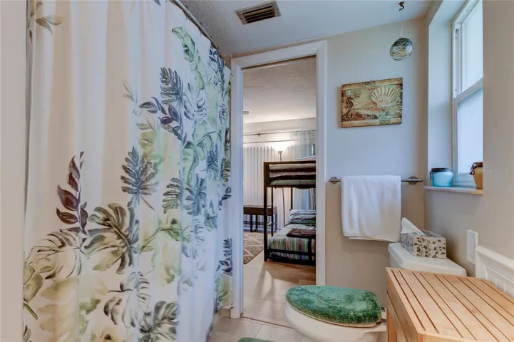 Pocket door private access from bathroom #2 into the bunk bed room - bedroom #3