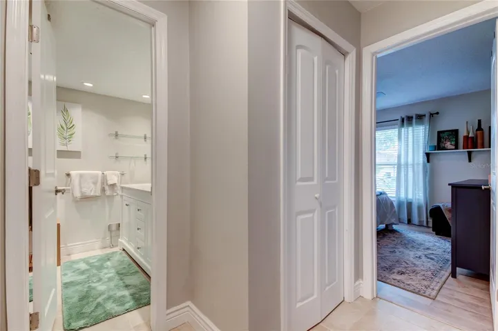 Hall way leading into bedroom #2 & bathroom #2- which is privately connect to bedroom #3