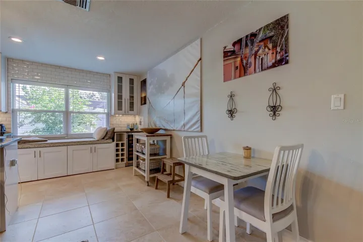 Cozy dinner for two, card game table, or sip your morning tea or coffee