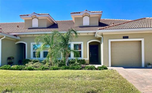 Brick paved driveway leads to entrance. Tile roof lasts 30+ years!