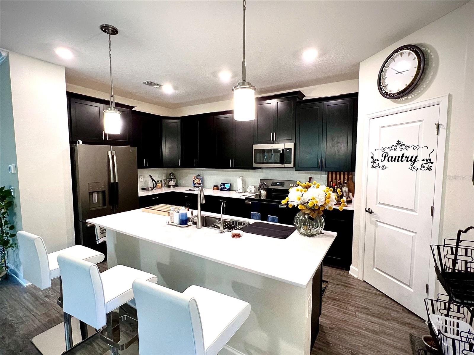 Well-appointed kitchen with walk-in pantry