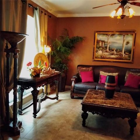 View of the formal living room on the left after entering the home
