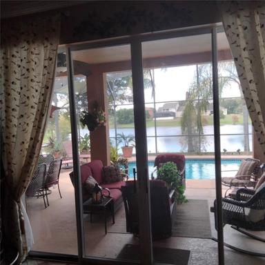 View from the first floor family room looking out toward the pond 