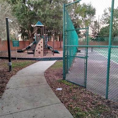 The community park, picnic area, playground and tennis court