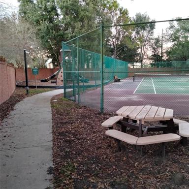 The community park, picnic area, playground and tennis court