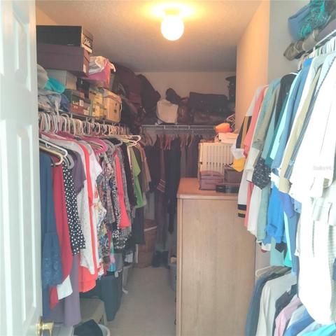 The large master bedroom has a large walk-in closet