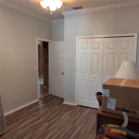 First Floor bedroom with laminate flooring and large closet