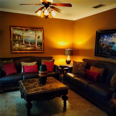 View of the formal living room on the left after entering the home
