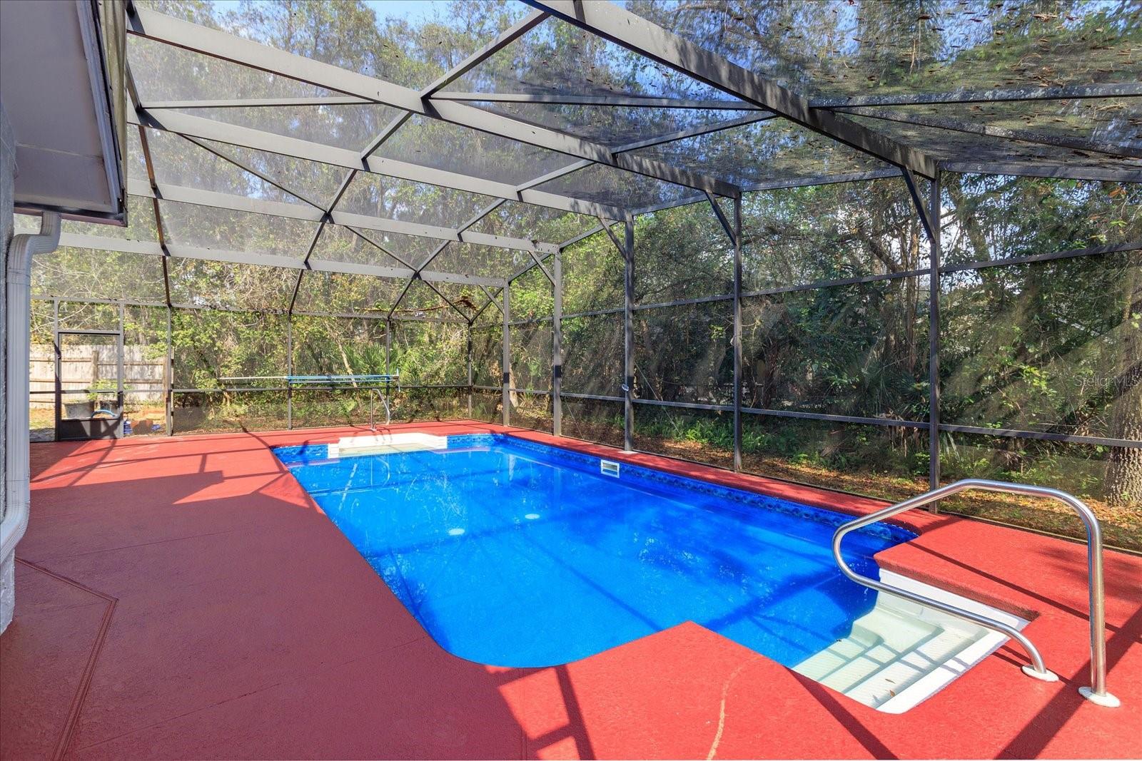 New pool liner and freshly painted ready for pool floats and drinks poolside