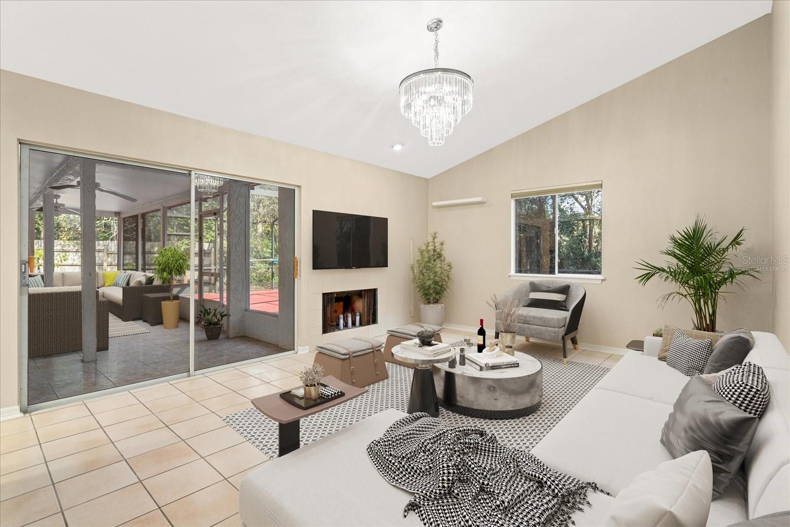 Virtually staged Family Room overlooks screened porch