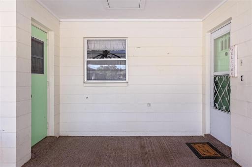Laundry room  door to left side . Front door to right
