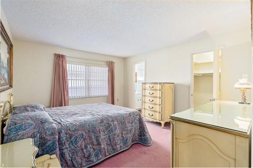 Owners suite with a private bathroom and walk in closet
