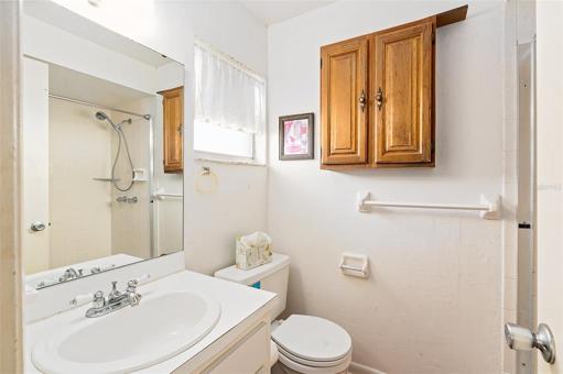 Owner's Bathroom with Walk in shower  stall with doors