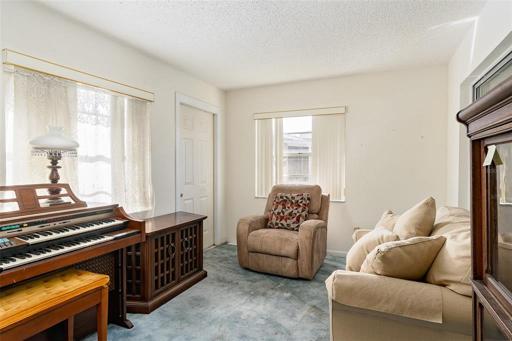 Florida Room , air conditioned space you could remove the sliding doors and enjoy it as additional office or sitting room year round!