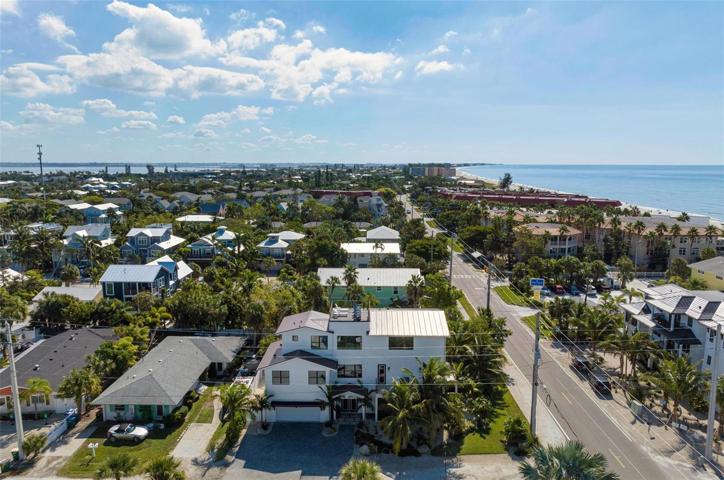 Beautiful corner property just steps to the beach!