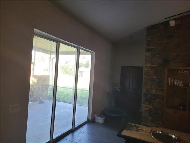 Hallway to cover patio and bed 2
