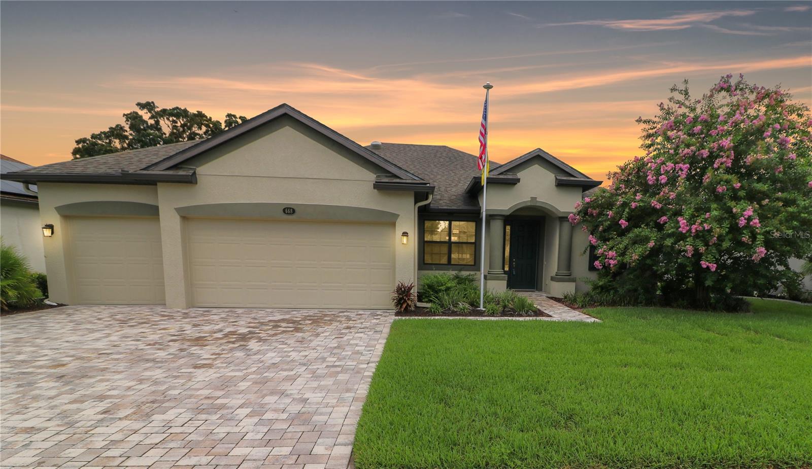 Exterior front. Paver drive and walkway.